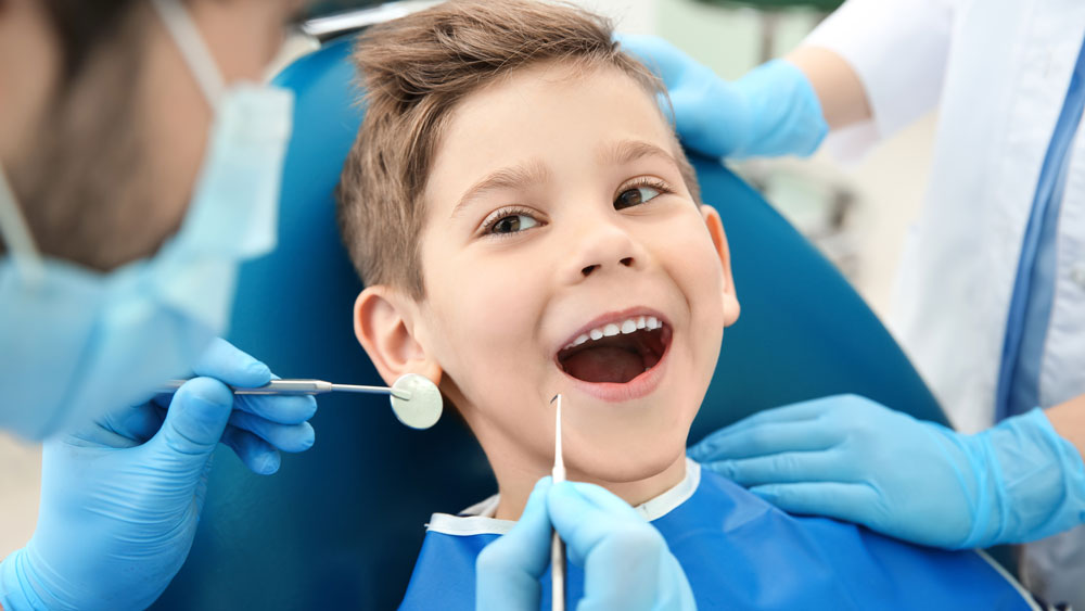 A happy child at the dentists.